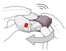 Due mani tengono un dispositivo medico bianco e viola mentre una freccia grigia indica un movimento rotatorio orizzontale verso sinistra