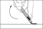 One hand holding an injection pen in a tilted position being rotated toward the