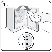 A hand removing a medication from an open refrigerator with a