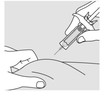 A hand holding a syringe with needle pointing toward the skin of a body part supported by the