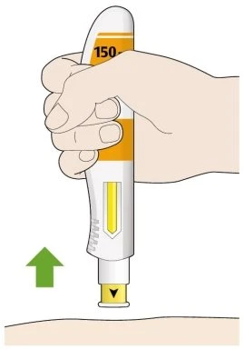 A hand holding a white and yellow medical device to apply it to the skin with a green arrow indicating downward movement