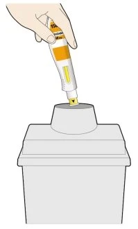 A hand holding a white and yellow cartridge inserting its tip into the opening of a gray container for storage