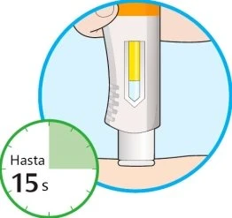 A hand holding a white and orange medical device applied to the skin with a timer indicating 15 seconds