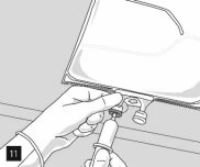 One hand holding a syringe and inserting the