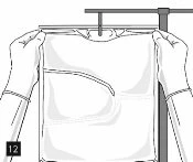 Black and white drawing showing two hands holding a stretched white t-shirt in front of a vertical support with a
