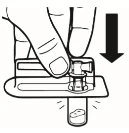 A hand pressing the button of a medical device over a glass vial, with a black arrow indicating downward movement