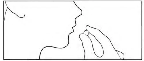 Side profile of a person holding a small white pill between the fingers near an open mouth to swallow it