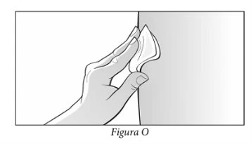 A hand holds between thumb and index finger a tissue or folded gauze on a vertically split white and gray background
