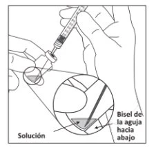 Technical drawing showing a hand inserting the