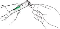 Two hands holding and separating the two components of a prefilled syringe to prepare the