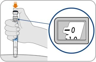 A hand holding a medical device with an orange arrow pointing toward the injection site