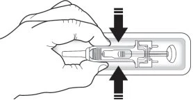 A hand holding a horizontal medical device while two black arrows indicate downward pressure on the top of the