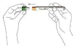 Two hands inserting a green cap onto the end of a gray and silver cylindrical injector pen following a black arrow