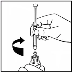A hand holds a syringe vertically and rotates it clockwise over a glass vial held by another hand