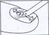 Disegno schematico che mostra il movimento rotatorio di una compressa o di un oggetto circolare su una superficie piana indicato da frecce curve