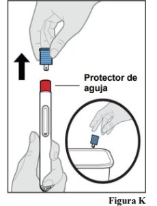 A hand removes the blue cap from an injection pen while the