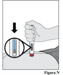 A hand pressing a medical device against the skin with a magnified view showing the level of blue liquid inside