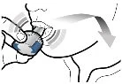 A hand presses a medical device against the skin with a gray arrow indicating downward movement for the