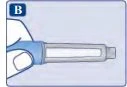 Una mano tiene un dispositivo medico cilindrico blu e grigio con una finestra trasparente che mostra il contenuto interno su sfondo azzurro