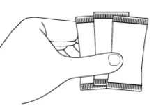 A hand holding three overlapping rectangular sachets with serrated edges for medication