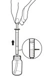 A hand holds a syringe above a vial while pulling the plunger up toward the