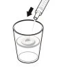 A syringe is inserted vertically into a transparent cup containing liquid, indicated by a black downward arrow