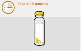 Иконка часов со стрелками, указывающими время, оранжевый текст «Esperre 15 minutos» и медицинский флакон с жёлтой крышкой на сером фоне