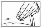 A hand grasps a fold of skin and subcutaneous tissue with the fingers to prepare the area for