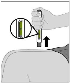 A hand holding an auto-injector above a person's shoulder with a magnified view showing the level of green liquid inside the device