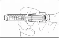 Black line drawing of a hand horizontally holding a syringe-shaped medical device with visible internal mechanism