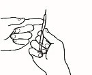 Two hands holding a syringe with needle pointing upward