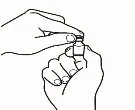 Two hands holding a small glass vial to open its cap or prepare the drug dosage