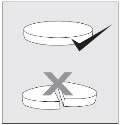 Drawing of a whole tablet with a checkmark above and a split tablet with a cross above to indicate correct usage