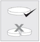 Drawing of a whole tablet with a checkmark above and a broken tablet with a cross above to indicate correct usage