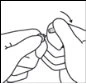 Two hands holding and rotating a small capsule or medical device with a curved arrow indicating the rotation movement