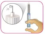 A hand holds an injection pen with a circular magnifier showing the display details