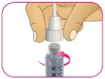 A hand holds a dropper above a small glass vial with a pink arrow indicating the rotational movement for attachment