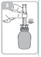 A hand holding a syringe with the