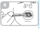 A hand holding a horizontal syringe and inserting the