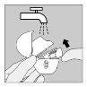 Schematic drawing of a hand holding a medical device under an open tap with water flowing toward it