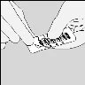 Two hands holding and carefully opening a tablet package or medication blister to remove the drug