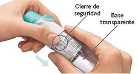 Two hands holding a medical device indicating safety lock closure and a transparent base with a blue arrow pointing downward