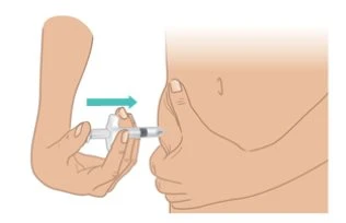 A hand holding a syringe ready for