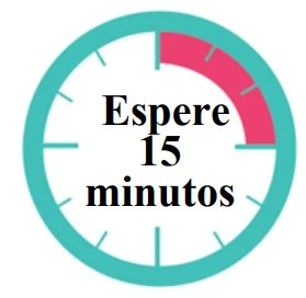 Circular clock with turquoise border and a pink section indicating a 15-minute interval with the text 'Wait 15 minutes' in the center