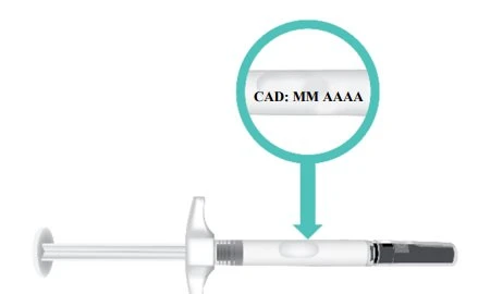 Illustration of a white syringe with a magnifying circle highlighting the text CAD: MM YYYY on the body of the device