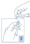 One hand holds a drug vial while the