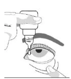 A hand holds a dropper bottle above an open eye while a drop of liquid is about to fall onto the eye surface