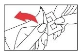 Two hands gently separating the two layers of a sheet or wrapper with a red arrow indicating movement to the left