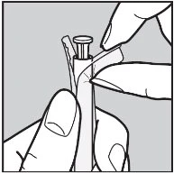 Two hands carefully open the protective packaging of a cylindrical vial to extract its contents
