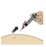 A hand holds a syringe at an angle to insert the
